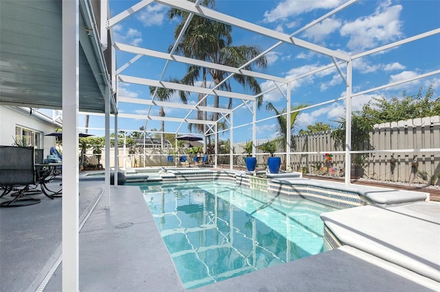 3244 Amaca Cir, Orlando, FL 32837 - view of swimming pool with fence, a patio area, a jacuzzi, and a lanai