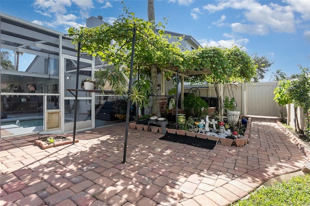 3244 Amaca Cir, Orlando, FL 32837 - view of patio / terrace featuring fence, a lanai, and a gate