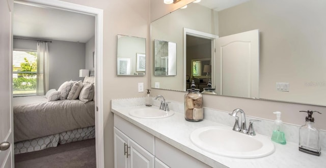 2349 Broadpoint Dr, Punta Gorda, FL 33983 - ensuite bathroom with double vanity, ensuite bathroom, and a sink