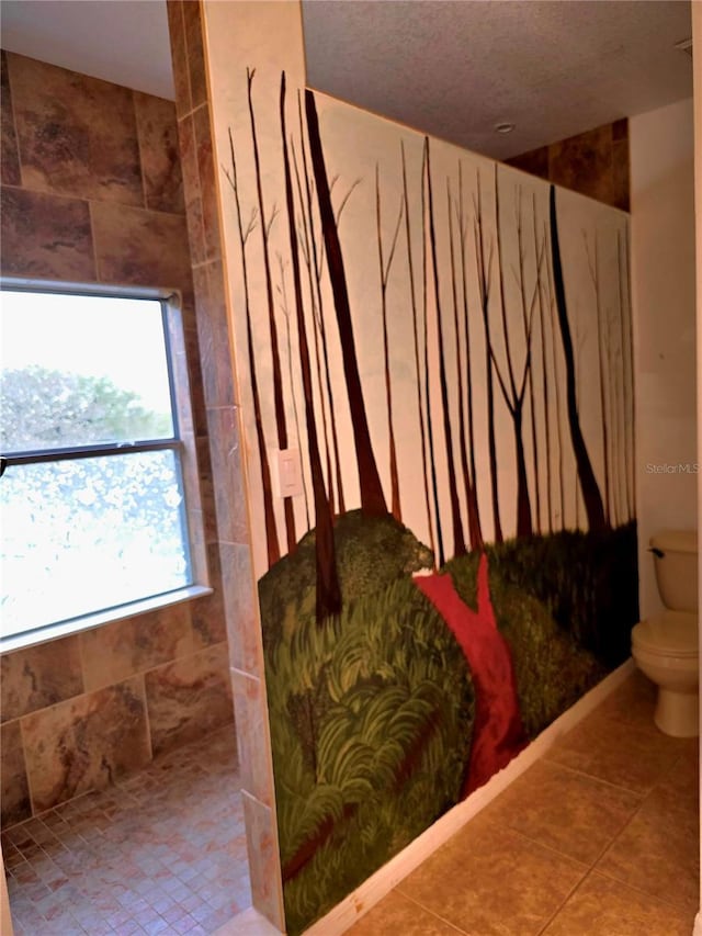 25012 Chipshot Ct, Sorrento, FL 32776 - bathroom with toilet, tile patterned floors, and a walk in shower