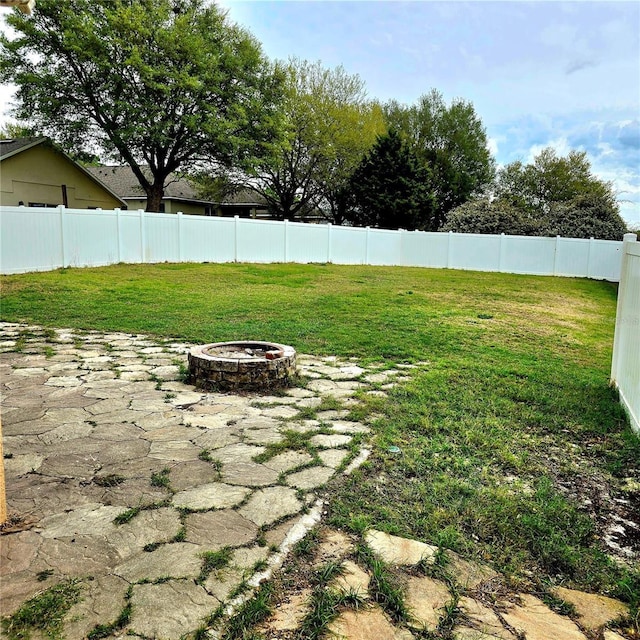 25012 Chipshot Ct, Sorrento, FL 32776 - view of yard featuring an outdoor fire pit and a patio