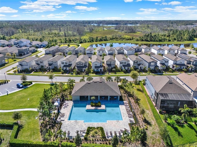 aerial view with a residential view and a water view