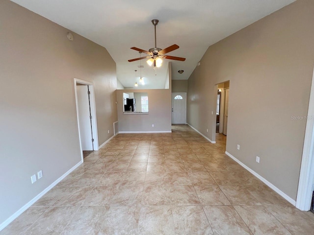 unfurnished living room with visible vents, baseboards, ceiling fan, light tile patterned flooring, and high vaulted ceiling