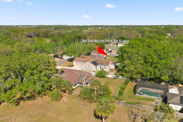 aerial view with a wooded view