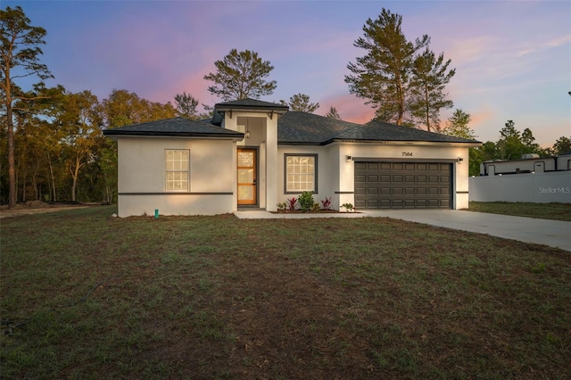 7564 N Gims Way, Citrus Springs, FL 34433 - prairie-style house featuring driveway, an attached garage, stucco siding, and a yard