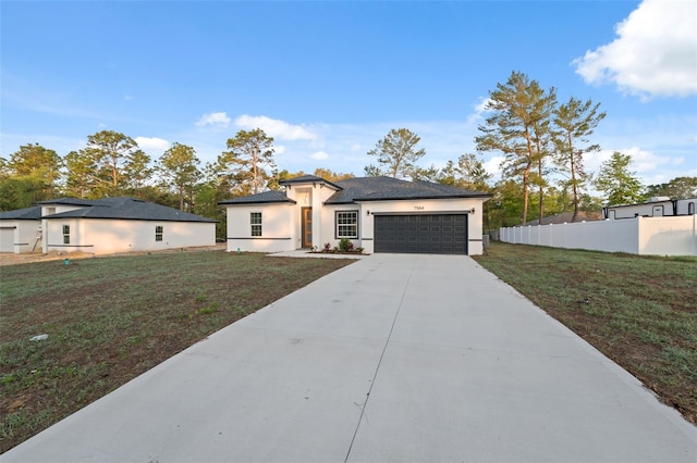 7564 N Gims Way, Citrus Springs, FL 34433 - view of front of property with an attached garage, driveway, and stucco siding