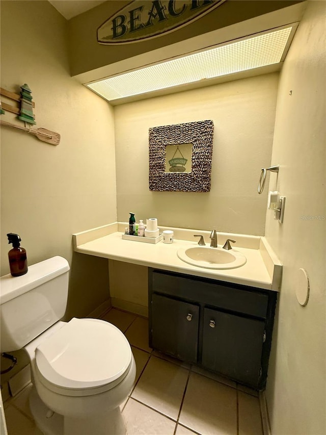 1886 Saint Andrews Pl Unit 1886, Longwood, FL 32779 - bathroom with toilet, vanity, and tile patterned floors
