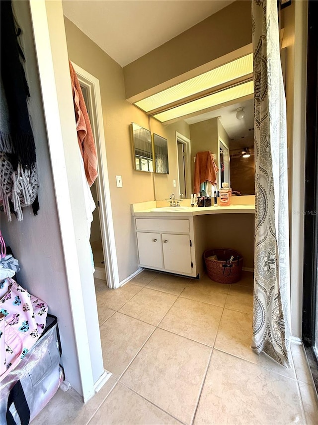 1886 Saint Andrews Pl Unit 1886, Longwood, FL 32779 - bathroom featuring tile patterned flooring and vanity