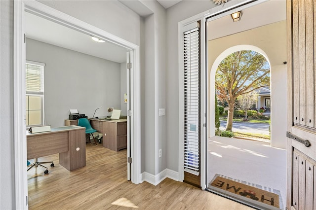 14645 Scott Key Dr, Winter Garden, FL 34787 - foyer with baseboards and light wood-style floors