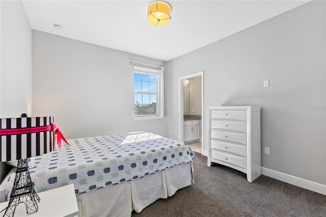14645 Scott Key Dr, Winter Garden, FL 34787 - bedroom with baseboards, carpet floors, and connected bathroom