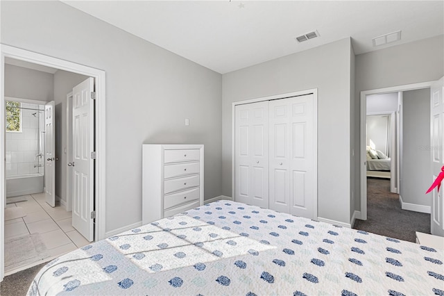 14645 Scott Key Dr, Winter Garden, FL 34787 - bedroom featuring visible vents, baseboards, a closet, and ensuite bath