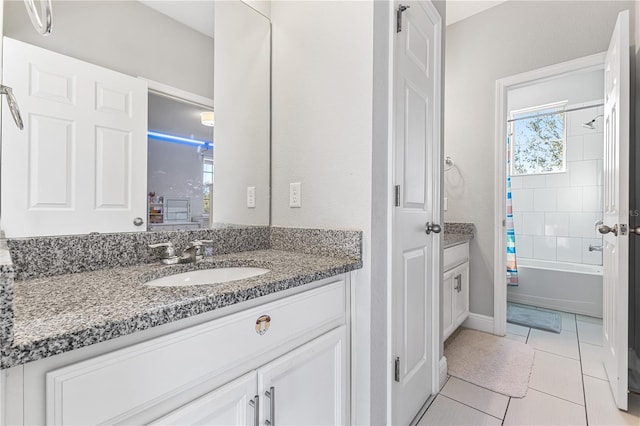 14645 Scott Key Dr, Winter Garden, FL 34787 - full bath featuring shower / bath combo with shower curtain, vanity, and tile patterned flooring