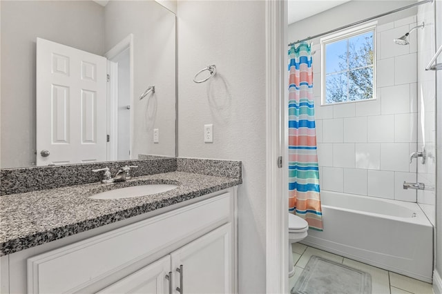 14645 Scott Key Dr, Winter Garden, FL 34787 - bathroom with tile patterned floors, toilet, vanity, and shower / bath combination with curtain