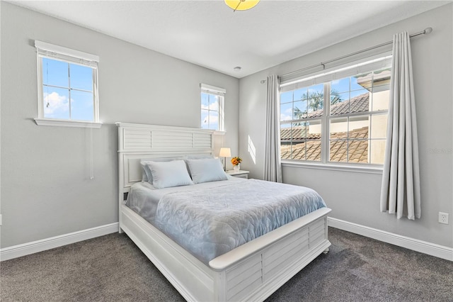 14645 Scott Key Dr, Winter Garden, FL 34787 - bedroom featuring baseboards and dark colored carpet