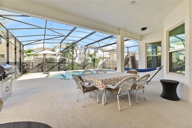 14645 Scott Key Dr, Winter Garden, FL 34787 - view of patio with an outdoor pool, glass enclosure, a grill, and outdoor dining space