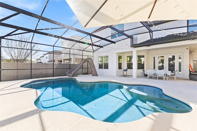 14645 Scott Key Dr, Winter Garden, FL 34787 - view of pool with glass enclosure, a patio, french doors, and a water slide