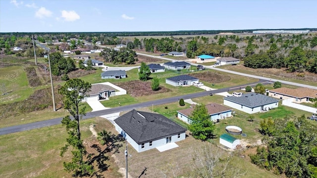 drone / aerial view with a residential view