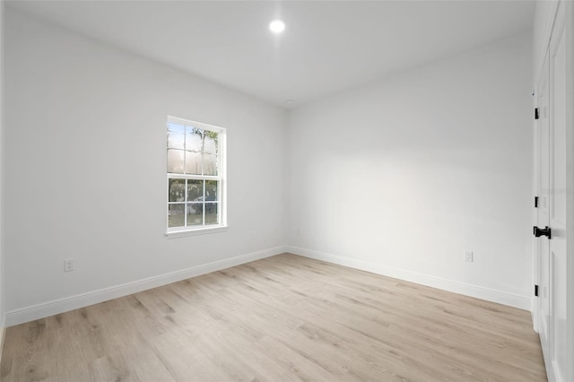 7550 N Gims Way, Citrus Springs, FL 34433 - unfurnished room featuring light wood-style flooring and baseboards