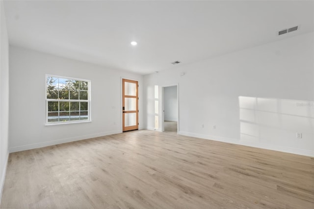 7550 N Gims Way, Citrus Springs, FL 34433 - empty room featuring light wood finished floors, baseboards, and recessed lighting