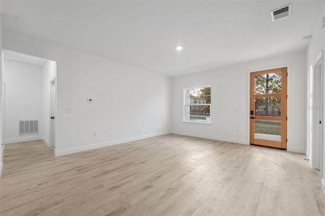 7550 N Gims Way, Citrus Springs, FL 34433 - empty room with light wood-type flooring, baseboards, and recessed lighting