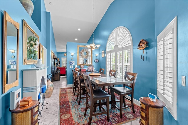 10589 Pelican Dr, Wellington, FL 33414 - dining room featuring tile patterned flooring, recessed lighting, baseboards, and high vaulted ceiling