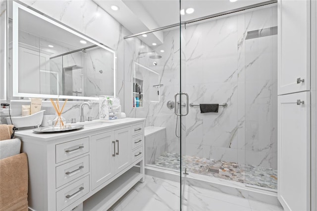 10589 Pelican Dr, Wellington, FL 33414 - full bathroom with a marble finish shower, recessed lighting, marble finish floor, and vanity