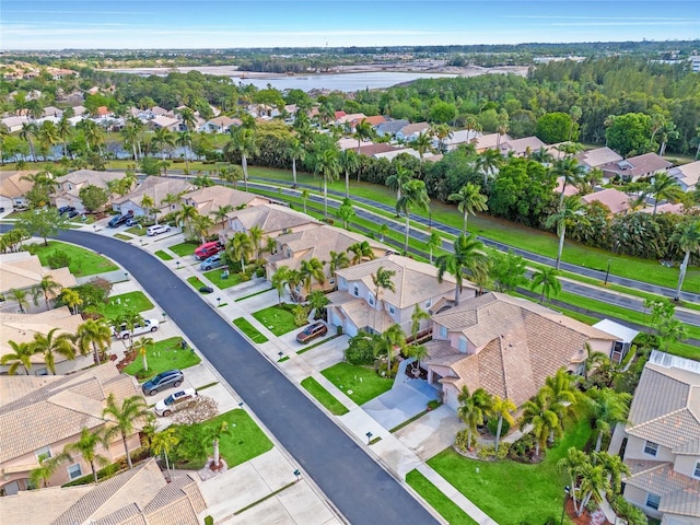 10589 Pelican Dr, Wellington, FL 33414 - drone / aerial view with a residential view and a water view