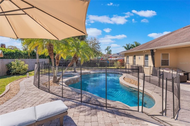 2361 Baker Ave, Orlando, FL 32833 - view of swimming pool with a patio, a fenced backyard, and a pool with connected hot tub