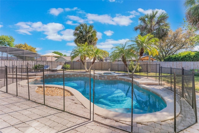 2361 Baker Ave, Orlando, FL 32833 - view of swimming pool featuring a patio area, fence, and a pool with connected hot tub