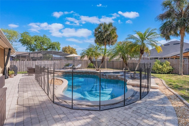 2361 Baker Ave, Orlando, FL 32833 - view of pool with a patio, a pool with connected hot tub, and a fenced backyard