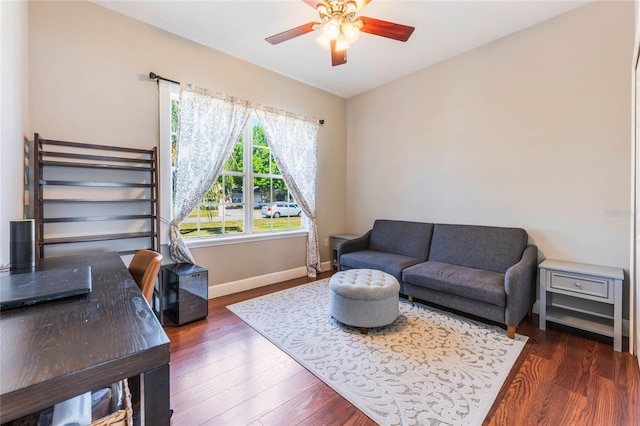 2361 Baker Ave, Orlando, FL 32833 - living area featuring baseboards, ceiling fan, and wood finished floors