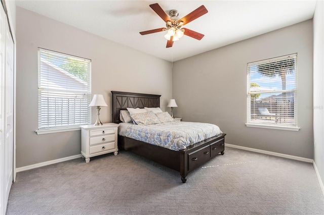 2361 Baker Ave, Orlando, FL 32833 - carpeted bedroom with a ceiling fan and baseboards