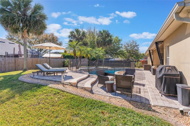 2361 Baker Ave, Orlando, FL 32833 - view of yard featuring a fenced backyard, a fenced in pool, and a patio
