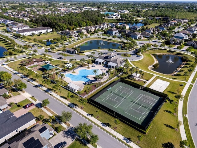 bird's eye view with a residential view and a water view