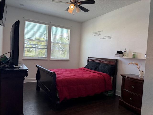 1337 Ash Tree Cv, Casselberry, FL 32707 - bedroom featuring baseboards, ceiling fan, wood finished floors, and a textured ceiling