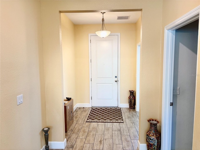 1337 Ash Tree Cv, Casselberry, FL 32707 - interior space with visible vents, baseboards, and wood finish floors