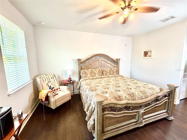1337 Ash Tree Cv, Casselberry, FL 32707 - bedroom with ceiling fan, baseboards, dark wood-style floors, and visible vents