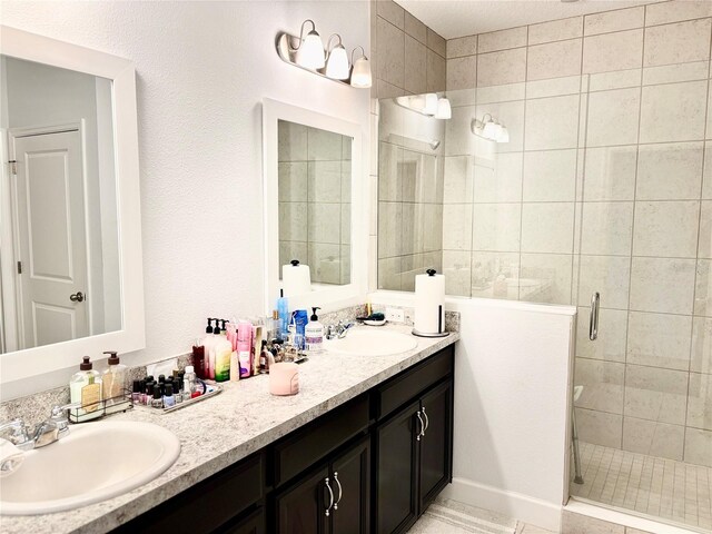 1337 Ash Tree Cv, Casselberry, FL 32707 - full bathroom with a shower stall, double vanity, and a sink