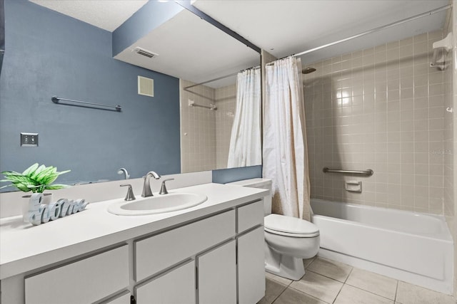 bathroom with visible vents, toilet, shower / bath combo with shower curtain, tile patterned floors, and vanity