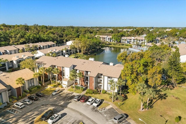 bird's eye view with a residential view and a water view