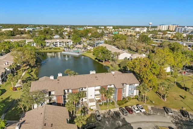 birds eye view of property with a residential view and a water view