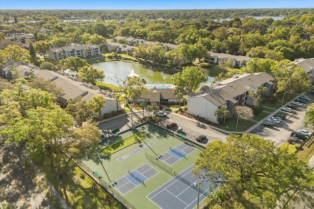 bird's eye view featuring a residential view and a water view