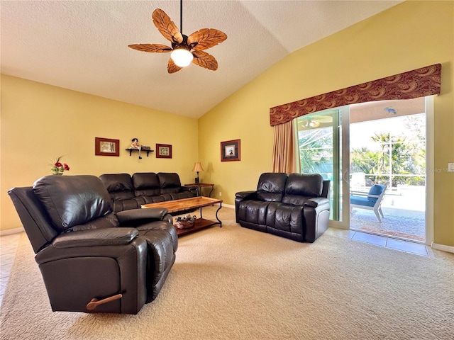 2519 Cypress Trace Cir, Orlando, FL 32825 - carpeted living area featuring vaulted ceiling, ceiling fan, baseboards, and a textured ceiling