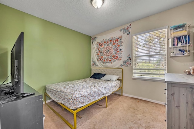 5910 Windsong Oak Dr, Leesburg, FL 34748 - carpeted bedroom featuring baseboards and a textured ceiling