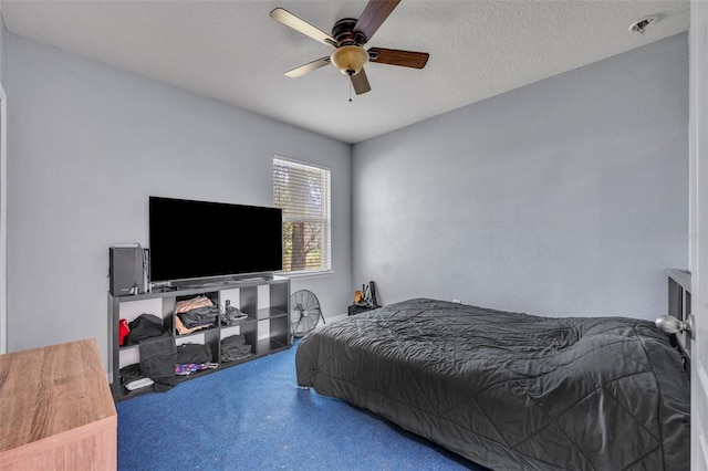 5910 Windsong Oak Dr, Leesburg, FL 34748 - carpeted bedroom featuring a textured ceiling and a ceiling fan