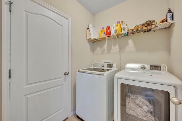 5910 Windsong Oak Dr, Leesburg, FL 34748 - laundry area with separate washer and dryer and laundry area