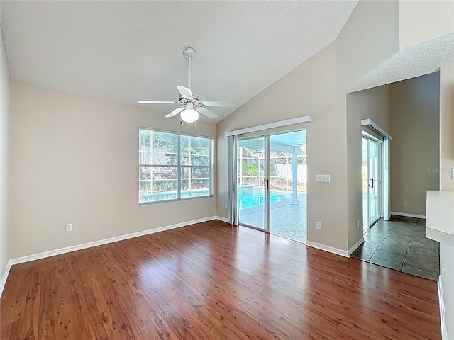 358 Morning Creek Cir, Apopka, FL 32712 - unfurnished room featuring high vaulted ceiling, baseboards, ceiling fan, and wood finished floors