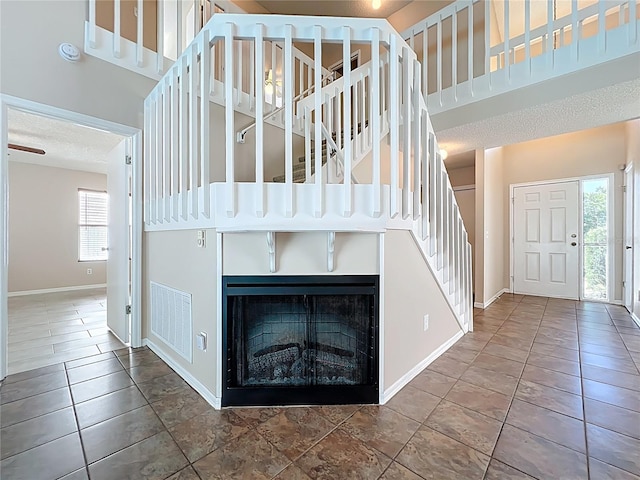 358 Morning Creek Cir, Apopka, FL 32712 - stairs featuring visible vents, baseboards, and a high ceiling