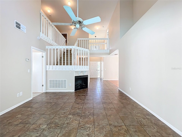 358 Morning Creek Cir, Apopka, FL 32712 - unfurnished living room featuring visible vents, baseboards, and a ceiling fan