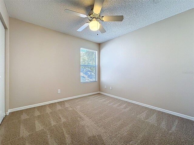 358 Morning Creek Cir, Apopka, FL 32712 - carpeted spare room featuring baseboards, a textured ceiling, and a ceiling fan